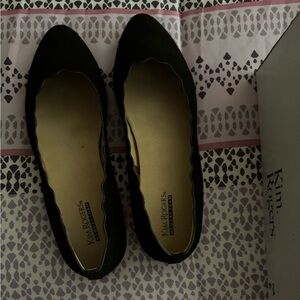 Never worn.  A black flat. Can be worn with slacks, jeans or skirt.